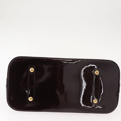 Louis Vuitton Alma Handbag
Monogram patent...
