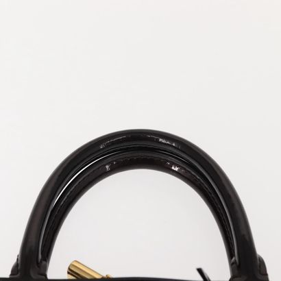 Louis Vuitton Alma Handbag
Monogram patent...