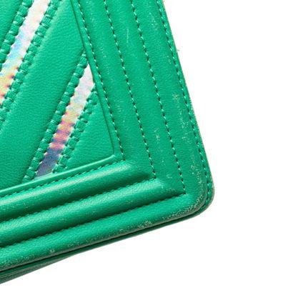 Chanel Boy Flap Bag
Herringbone leather shoulder...