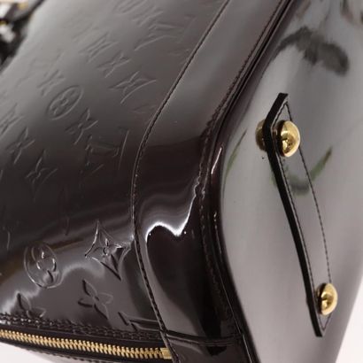 Louis Vuitton Alma Handbag
Monogram patent...