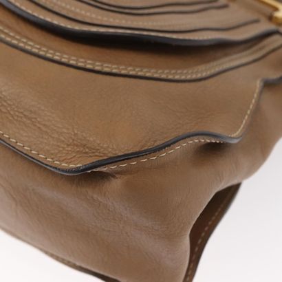 Chloé Marcie Satchel
Studded leather handbag,...