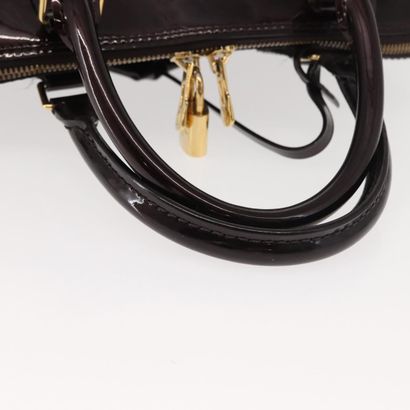Louis Vuitton Alma Handbag
Monogram patent...