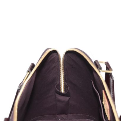 Louis Vuitton Alma Handbag
Monogram patent...