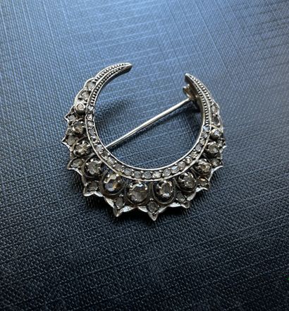 Silver and 18K gold crescent moon brooch...