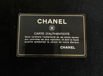 Chanel Boy Flap Bag
Herringbone leather shoulder...