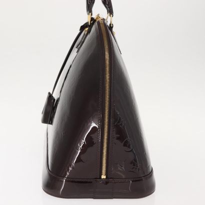 Louis Vuitton Alma Handbag
Monogram patent...