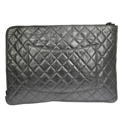 Chanel iPad Pouch
Quilted leather iPad Pouch...