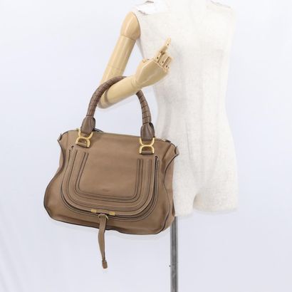 Chloé Marcie Satchel
Studded leather handbag,...