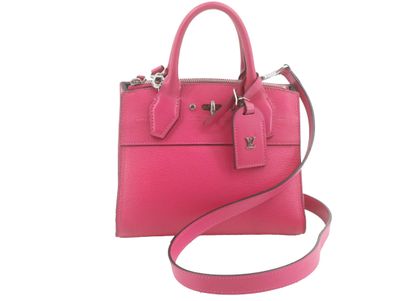 Louis Vuitton City Steamer Handbag
Leather...