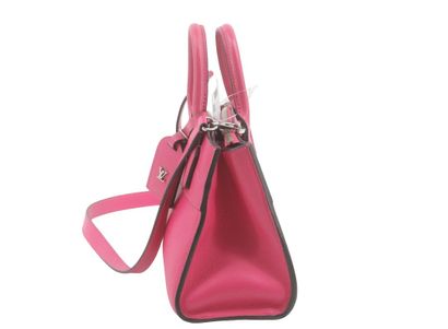 Louis Vuitton City Steamer Handbag
Leather...