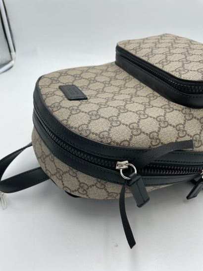 Gucci Front Pocket Backpack
GG coated canvas...
