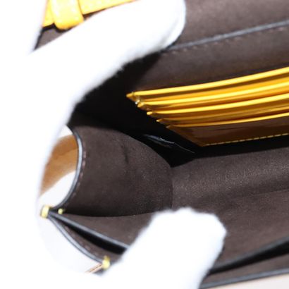 Fendi Curligraphy Shoulder Bag
Enameled patent...