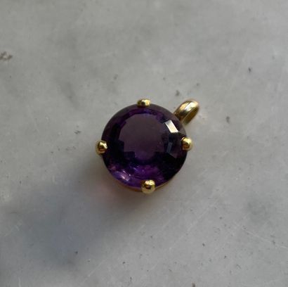 18K gold and 4.5 ct faceted amethyst pendant...