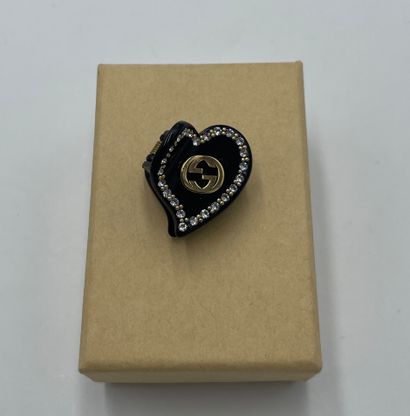 Gucci Interlocking G Heart Hair Clip
Plastic...