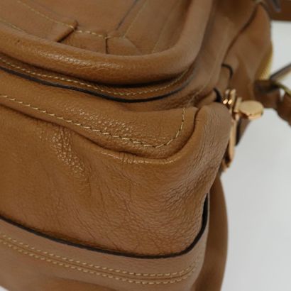 Chloé Paraty Top Handle Bag
Leather handbag,...