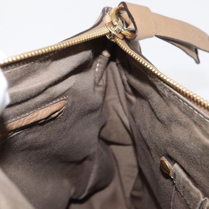 Chloé Marcie Satchel
Studded leather handbag,...