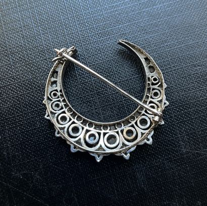 Silver and 18K gold crescent moon brooch...