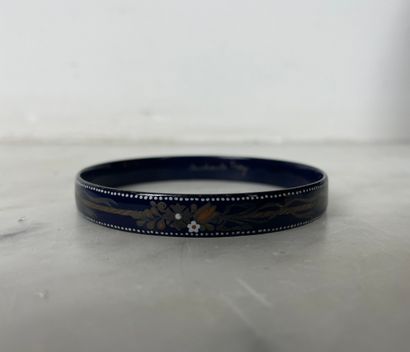 Blue enameled bangle with polychrome floral...