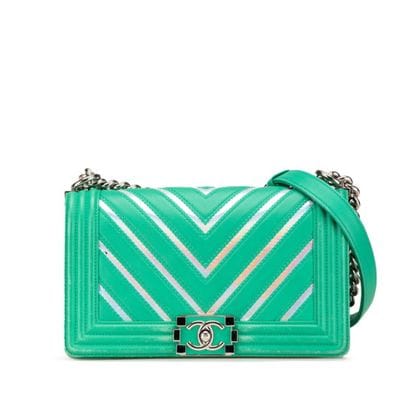 Chanel Boy Flap Bag
Herringbone leather shoulder...