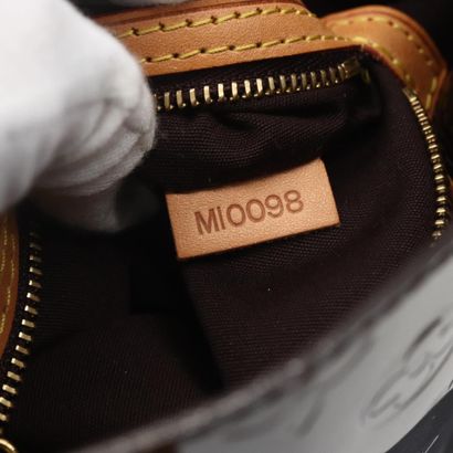 Louis Vuitton Reade
Monogram Vernis patent...