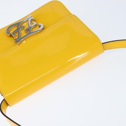 Fendi Curligraphy Shoulder Bag
Enameled patent...