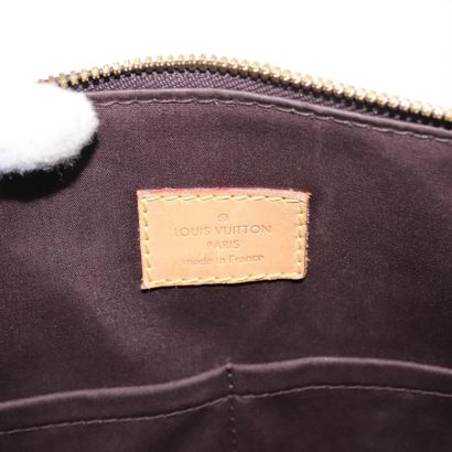 Louis Vuitton Alma Handbag
Monogram patent...