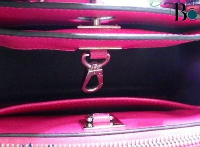 Louis Vuitton City Steamer Handbag
Leather...
