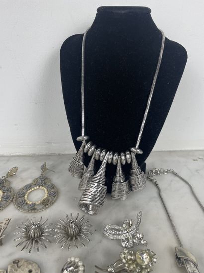 Large lot of silver-tone costume jewelry,...