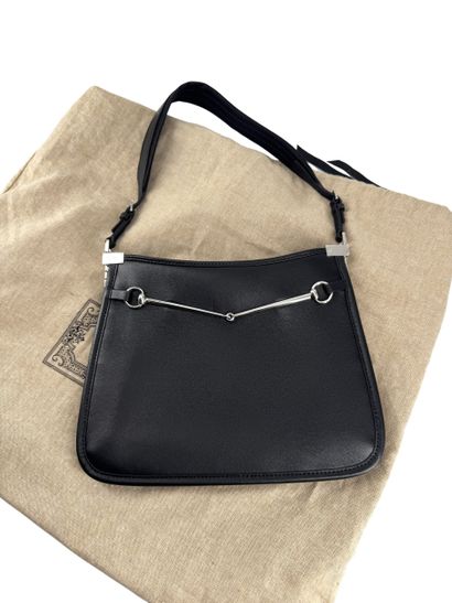 Gucci Horsebit 1955 Shoulder Bag
Sac porté...