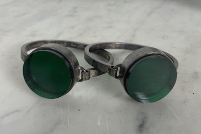 Pair of rigid, articulated silver-plated...