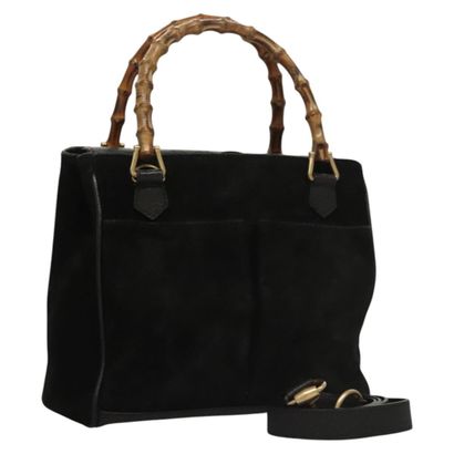 Gucci Bamboo Zip Pouch

Sac à main compact...