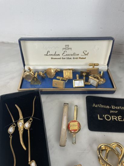 Large assortment of gold-tone costume jewelry...