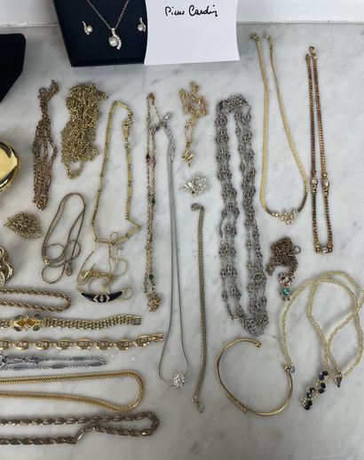 Large assortment of gold-tone costume jewelry...