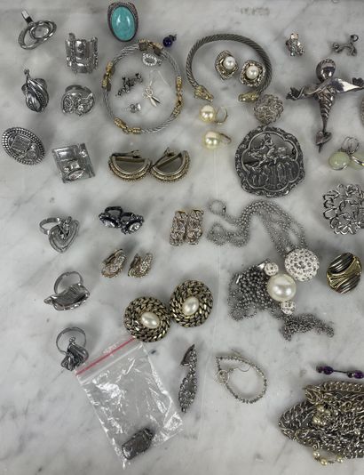 Large lot of silver-tone costume jewelry,...