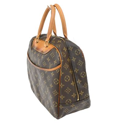Louis Vuitton Deauville
Sac à main en toile...