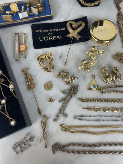 Large assortment of gold-tone costume jewelry...