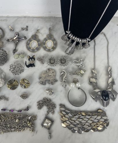 Large lot of silver-tone costume jewelry,...