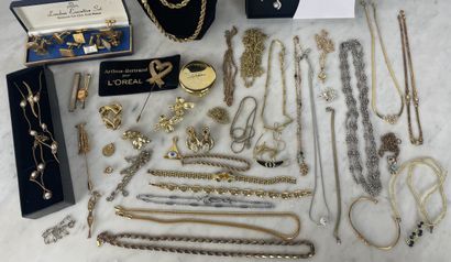 Large assortment of gold-tone costume jewelry...