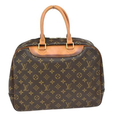 Louis Vuitton Deauville
Sac à main en toile...