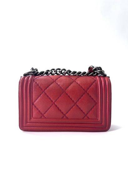 Chanel Sac Flap
Sac à main en cuir matelassé,...