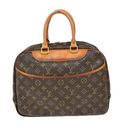Louis Vuitton Deauville
Sac à main en toile...