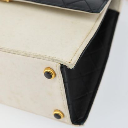 Chanel Vintage Trapezoid CC Flap Bag
Sac...