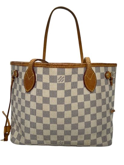Louis Vuitton Neverfull Tote
Sac cabas en...