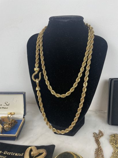 Large assortment of gold-tone costume jewelry...