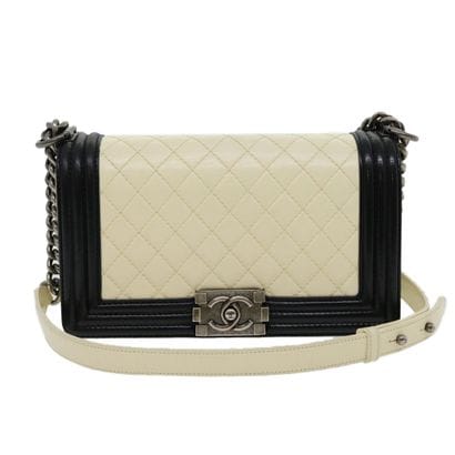 Chanel Boy Bag
Sac à main en cuir matelassé,...