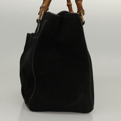 Gucci Bamboo Zip Pouch

Sac à main compact...