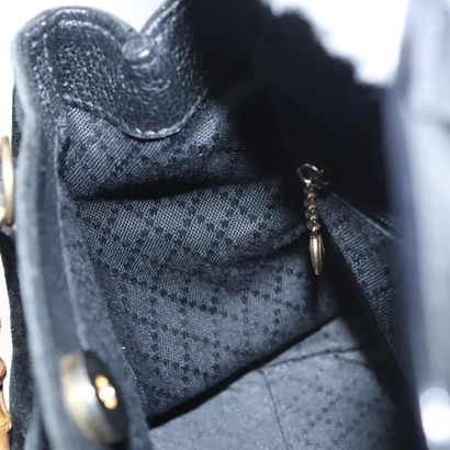Gucci Bamboo Zip Pouch

Sac à main compact...