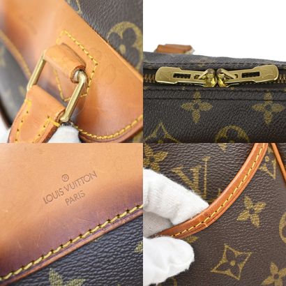 Louis Vuitton Deauville
Sac à main en toile...