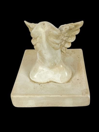 Winged phallus on base
Sculpture in molded...