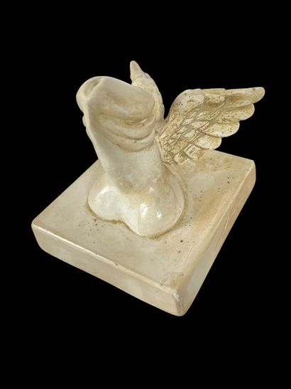 Winged phallus on base
Sculpture in molded...